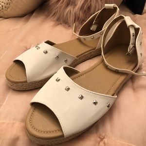 White studded platforms